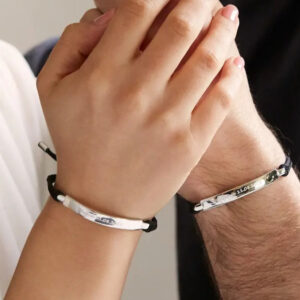 A couple wearing bracelets